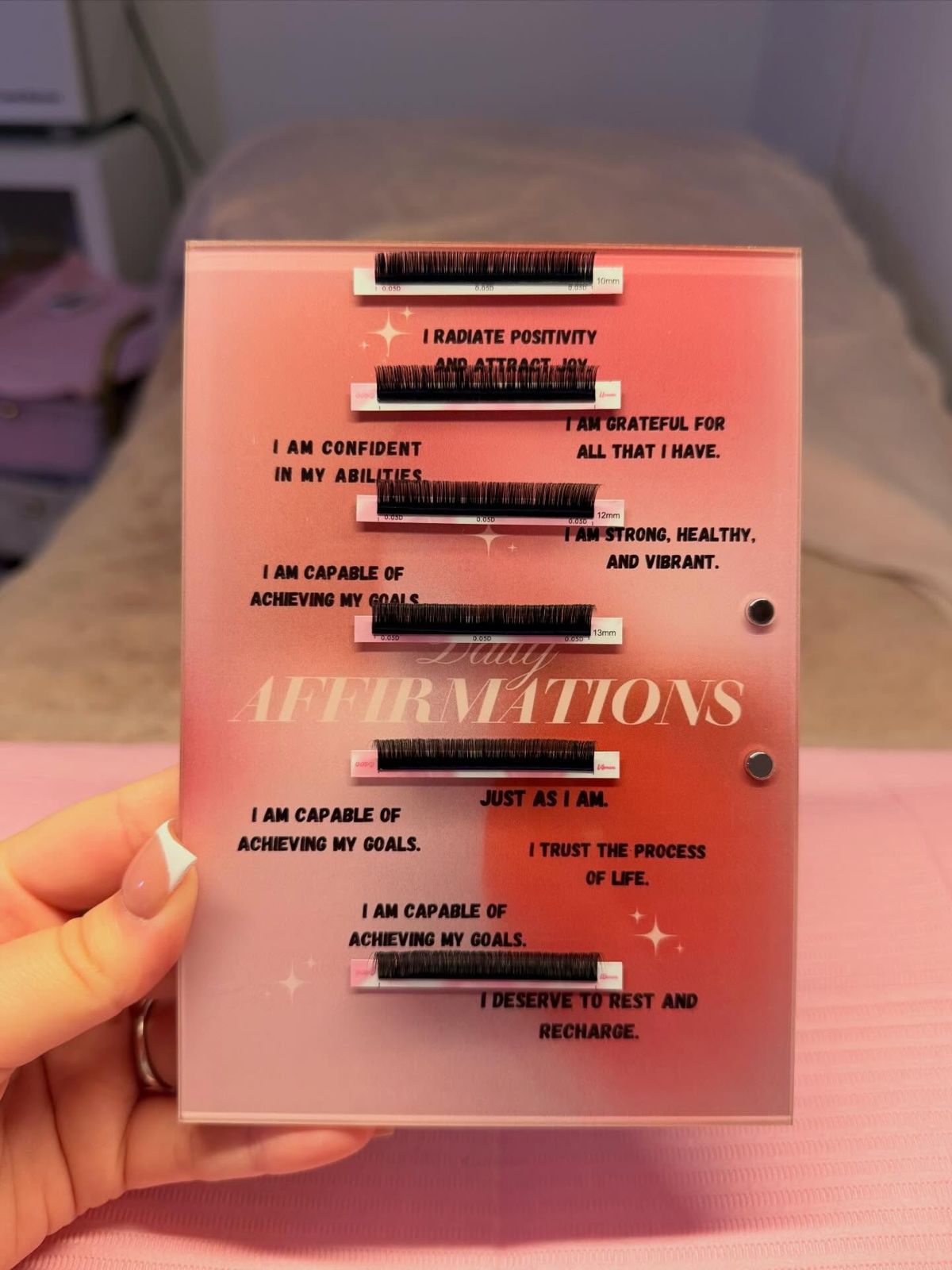 Lash tile printed with daily affirmations